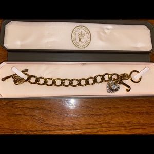 New! Never been worn! Juicy Couture Gold Charm Bracelet with diamond heart charm
